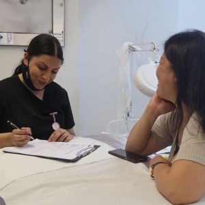 students practicing client consultation techniques